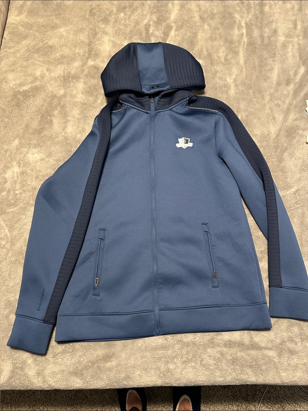Under Armour Golf Hooded Jacket in Black with Subtle Lime Trim